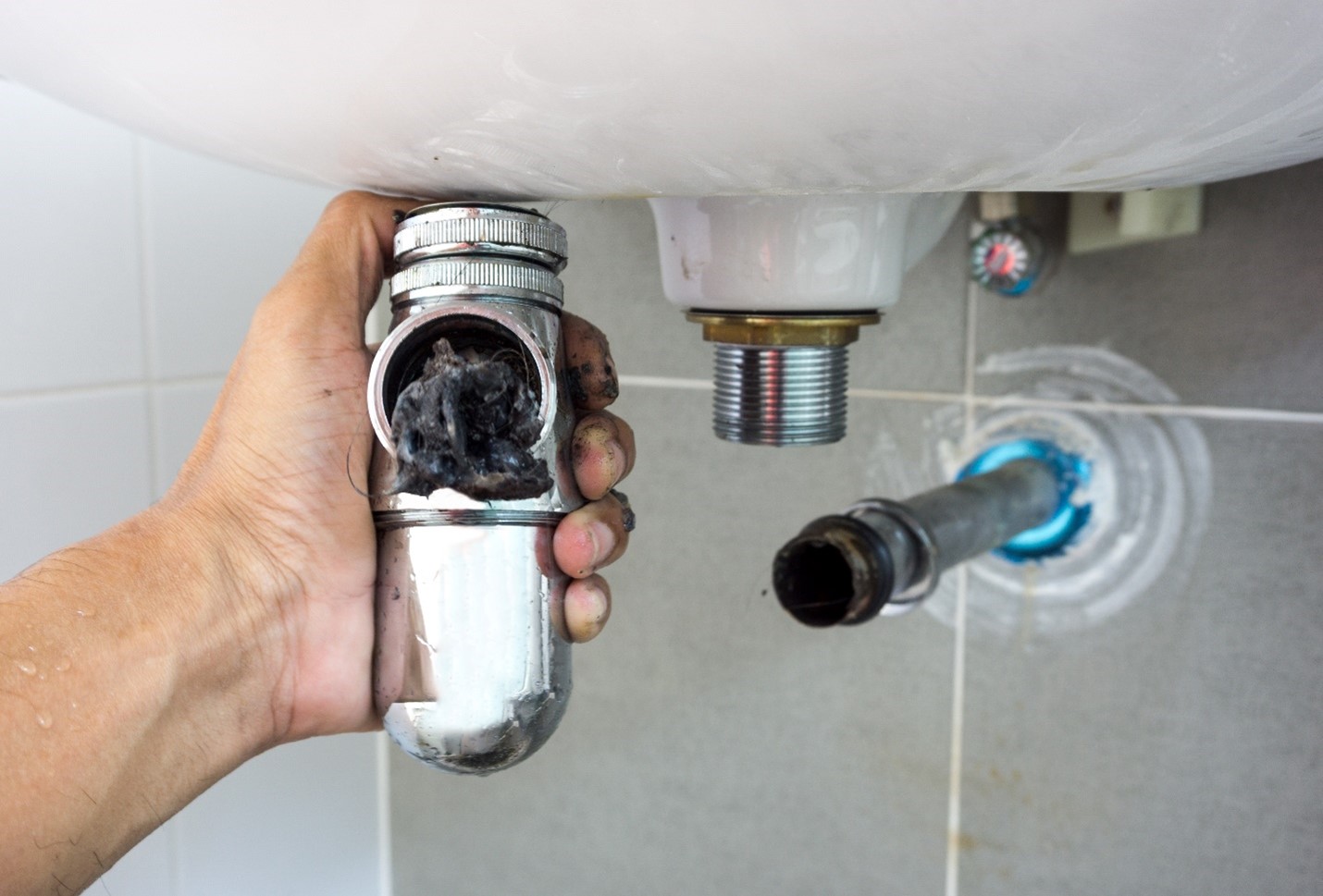 4 Ways to Remove Hair from A Clogged Drain (And Tips to Avoid It) - JPG  Plumbing